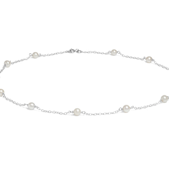 SIL 12x 5-5.5MM WHITE CULTURED PEARLS SET ON 18' TRACE CHAIN