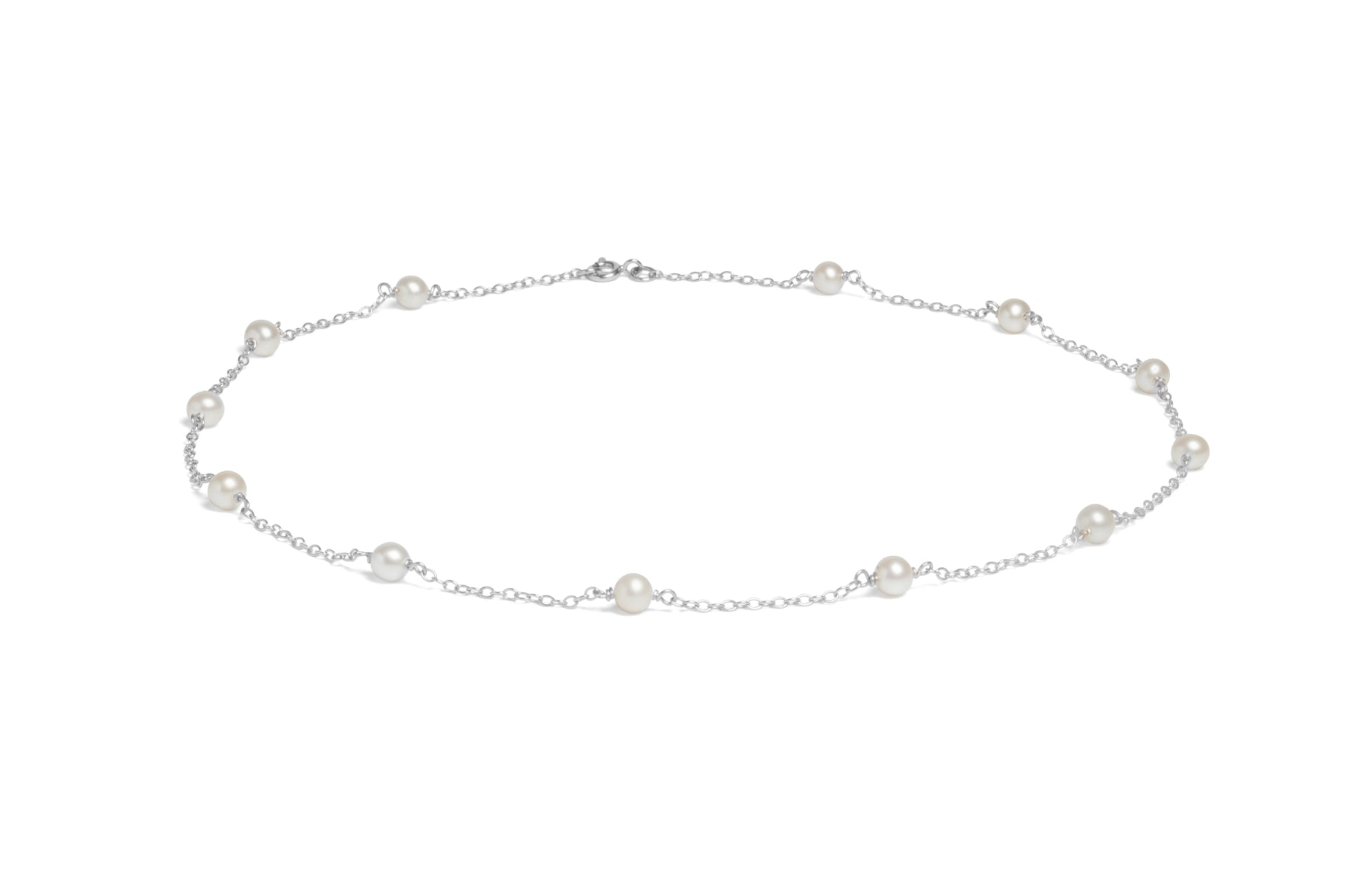 SIL 12x 5-5.5MM WHITE CULTURED PEARLS SET ON 18' TRACE CHAIN